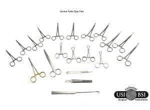A group of surgical instruments sitting on top of a table.