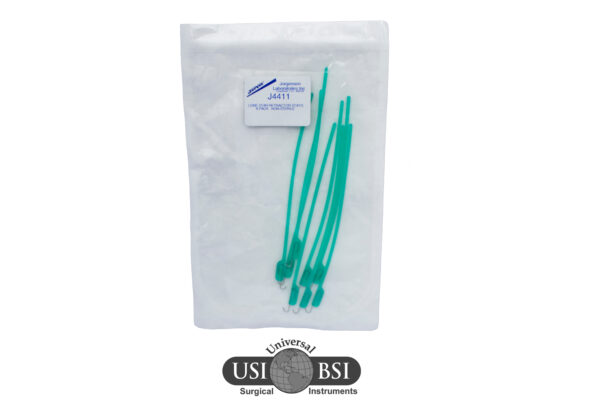A bag of green plastic toothbrushes on top of a white paper.